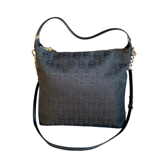 Michael Kors  Black Tassel Canvass Gold Tone Hardware Bag In Like new Condition. - Picture 8 of 14